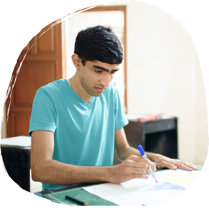 Student studying - SK operates under the aegis of Ayathi Trust